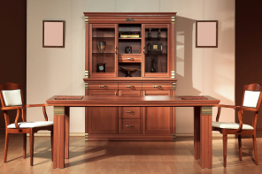 a desk and a cabinet in a room